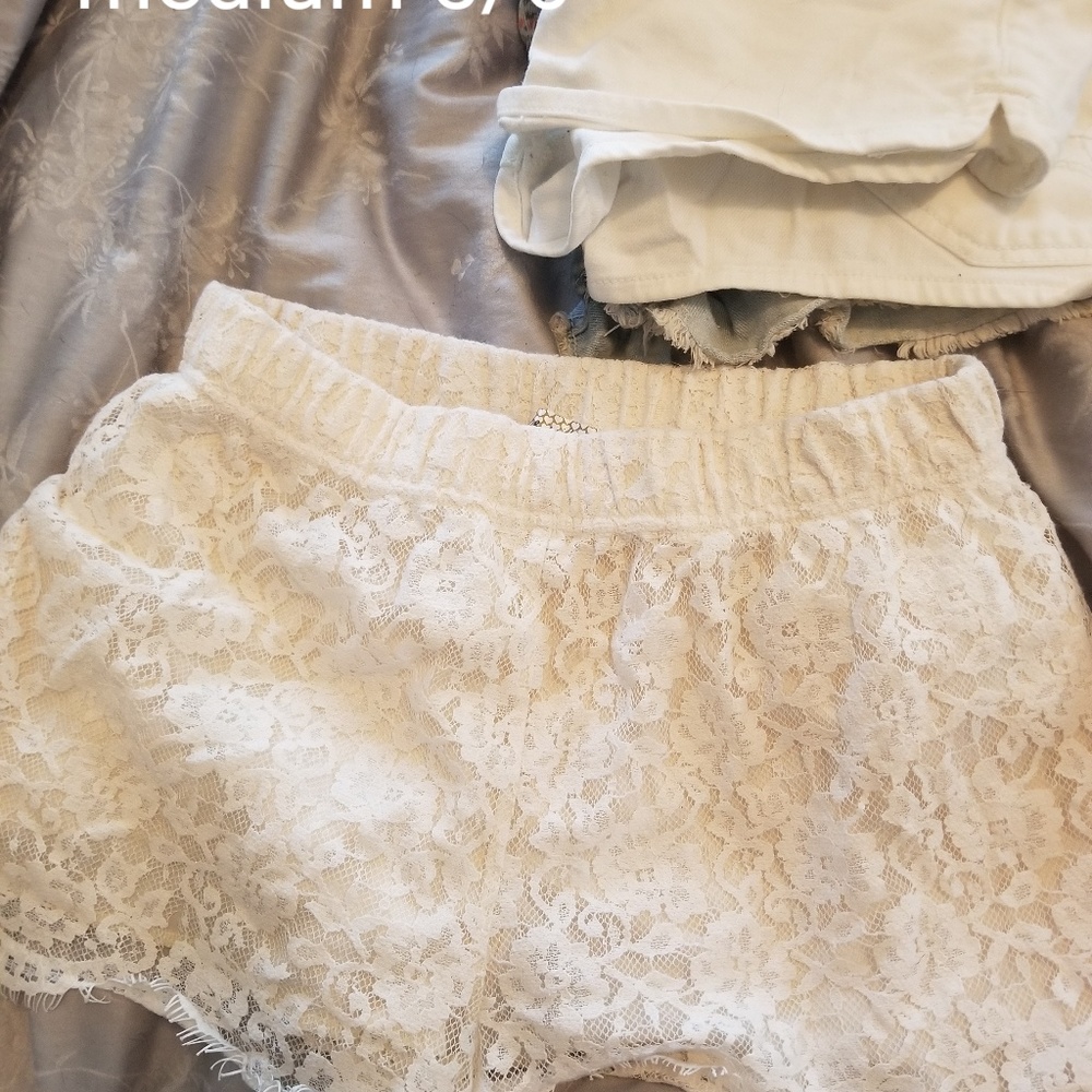 Elegant white lace shorts